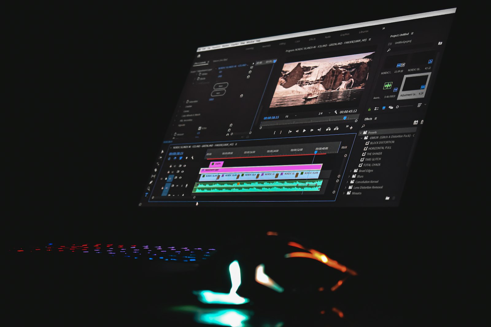 A computer monitor displaying video editing software with a timeline and preview window.